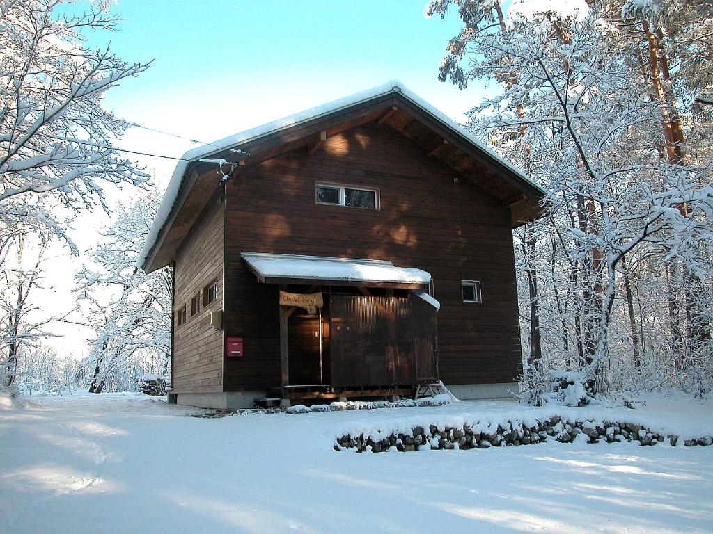 Hinata in Japan - a house covered in snow.