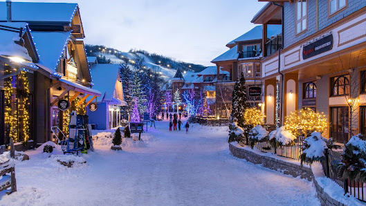 Spectacular winter view at Tufandağ in Azerbaijan. Ski slopes carve through the snowy landscape with a chalet nestled in the foreground, creating a picturesque setting for winter sports.