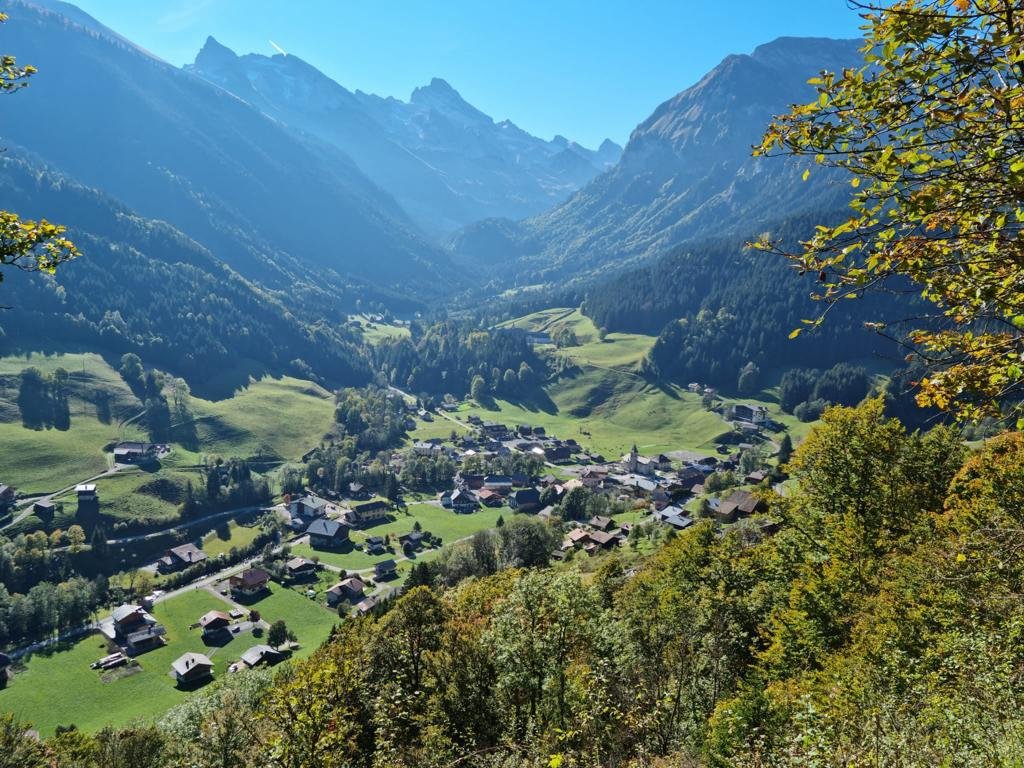 Hirmentaz | Les Habères – Bellevaux | Habère-Poche in France - a view of a valley with mountains in the background.