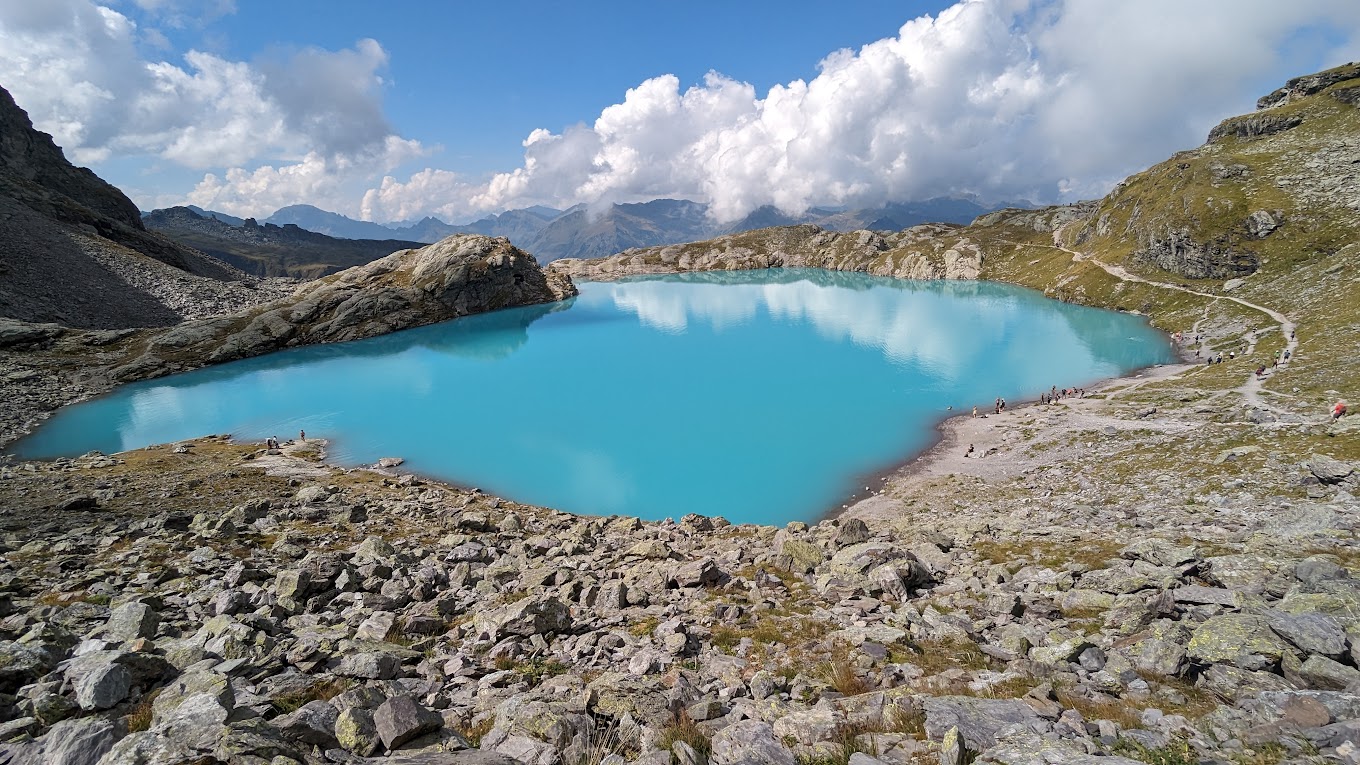 Pizol Pardiel Bad Ragaz Wangs in Switzerland - a large blue lake surrounded by rocks.