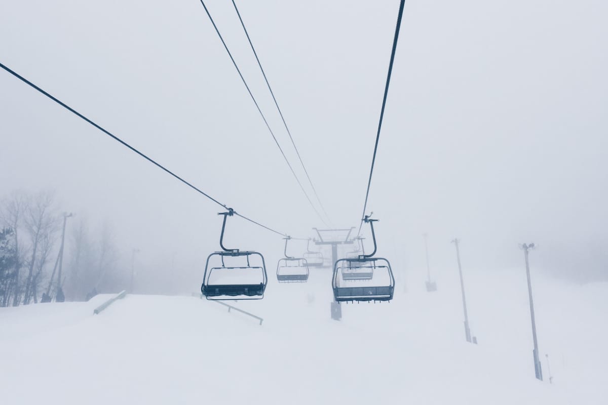 Port del Comte in Spain - a ski lift going up a snowy hill.