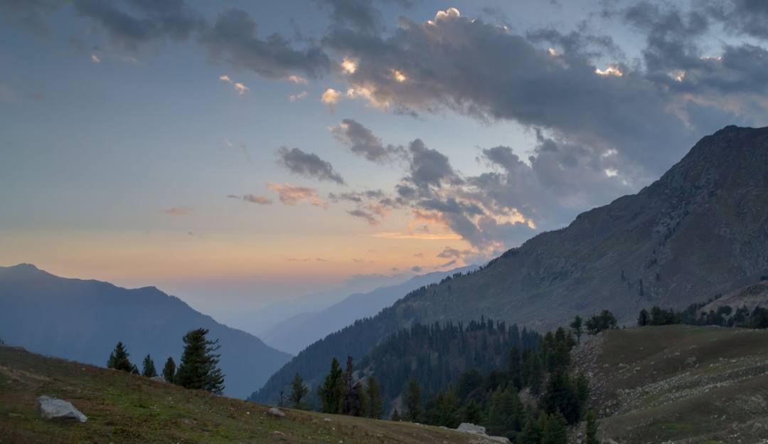 Alpine Base Area at Palisades Tahoe in USA - a sunset in the mountains.