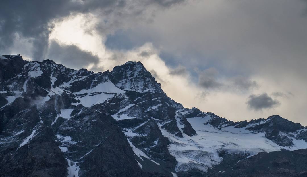 Alpine Base Area at Palisades Tahoe in USA - a snow covered mountain in the alps.
