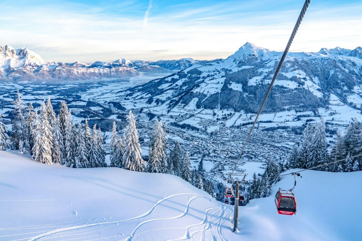 Kitzbüheler Horn in Austria - a ski lift going up a snowy mountain.