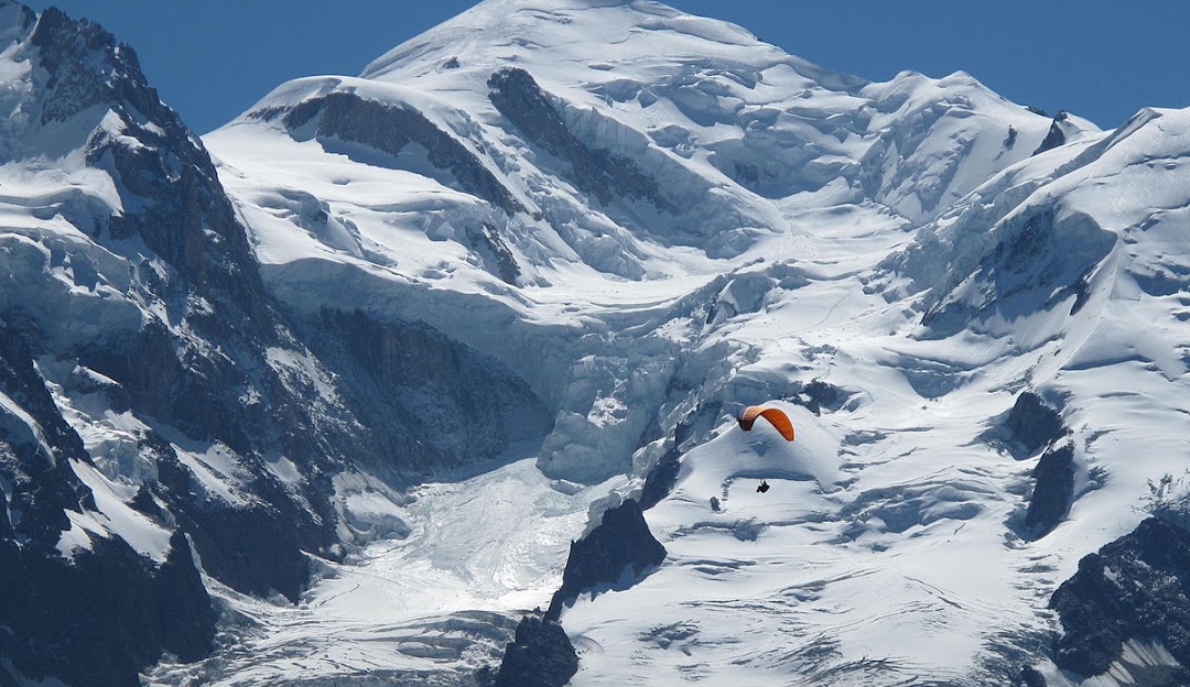 Chamonix Mont-Blanc in France - a person parading down the side of a mountain.