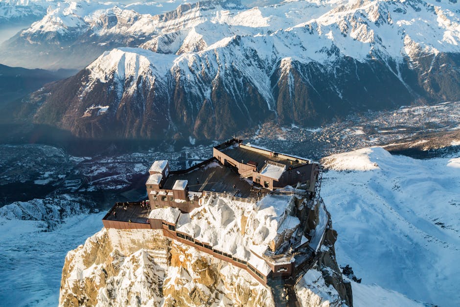 Chamonix Mont-Blanc in France - an aerial view of a mountain with snow covered mountains in the background.