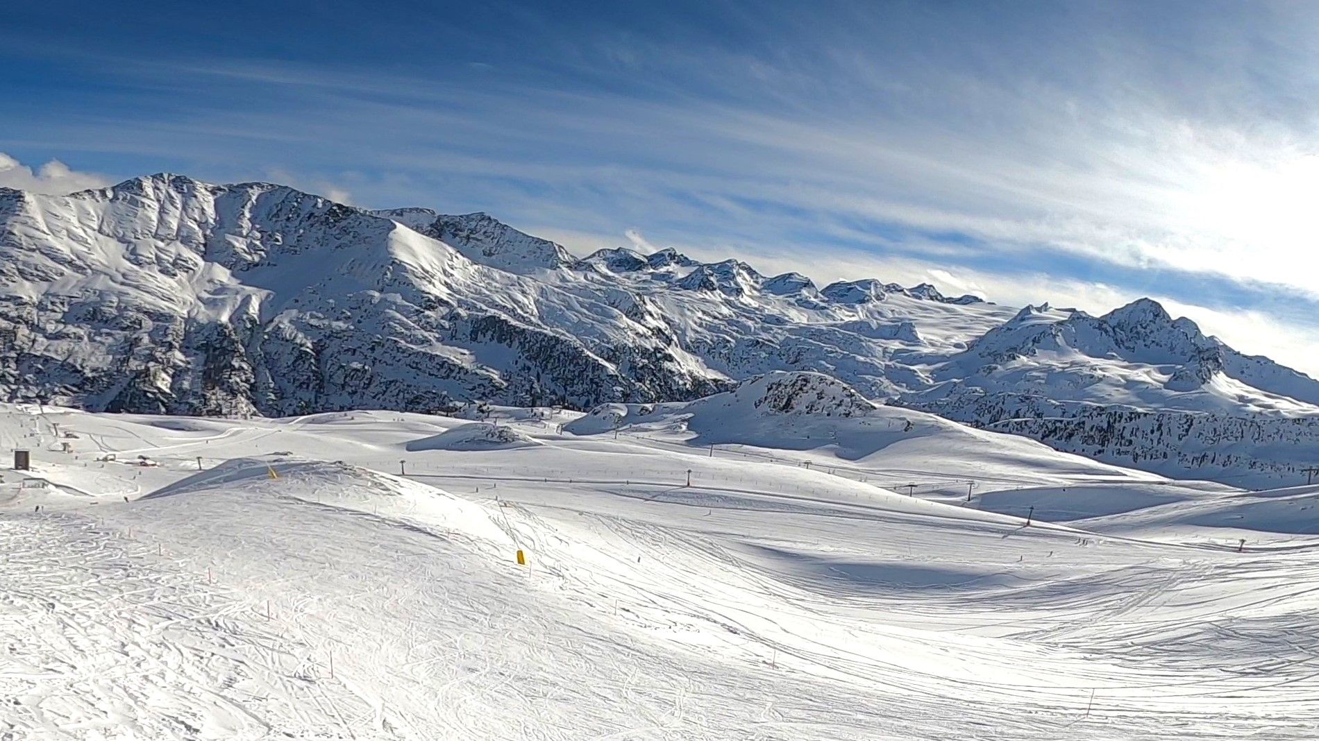 La Thuile in Italy - a person on a snowboard in the snow.