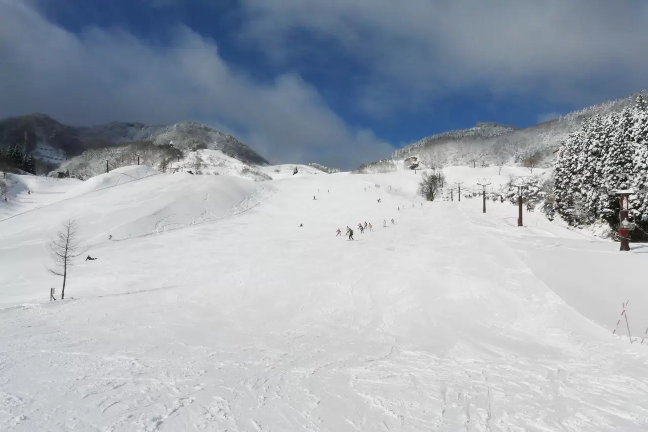 HachiKita Highlands in Japan - a snow covered ski slope in the mountains.