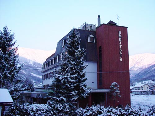 Winter sports centre at Hakuba 47 | Goryu in Chūbu, Japan showcasing an inviting chalet nestled amidst mesmerising winter scenery, underlining its popularity as a ski resort.