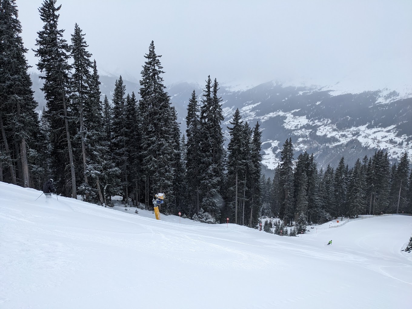 See in Austria - a person skiing down the side of a mountain.