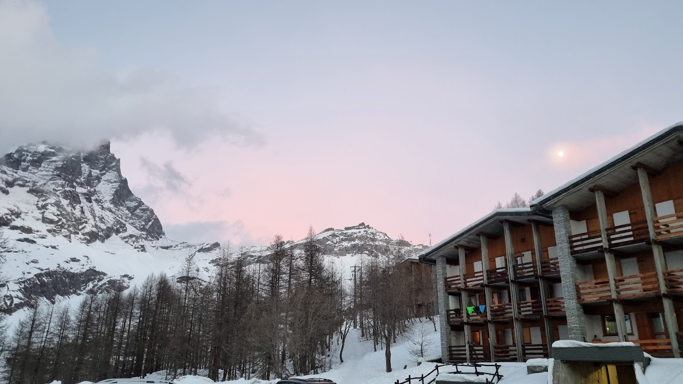 Cervinia Cielo Alto in Italy: a ski resort with a mountain in the background.