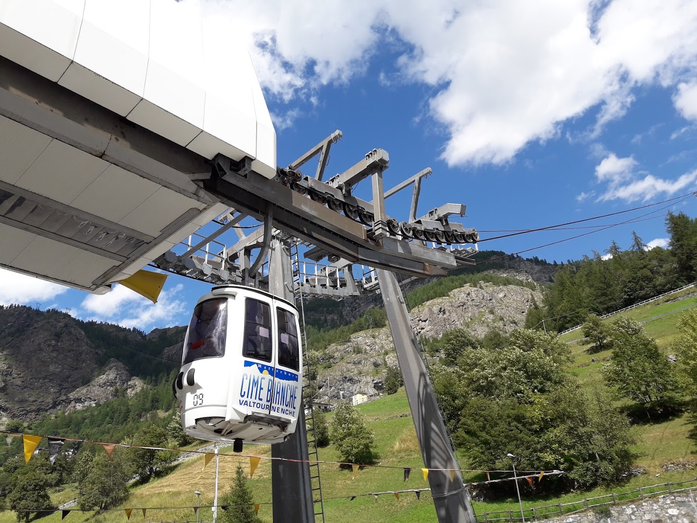 Cime Bianche Funivie Valtournenche in Italy - a cable car on the side of a mountain.