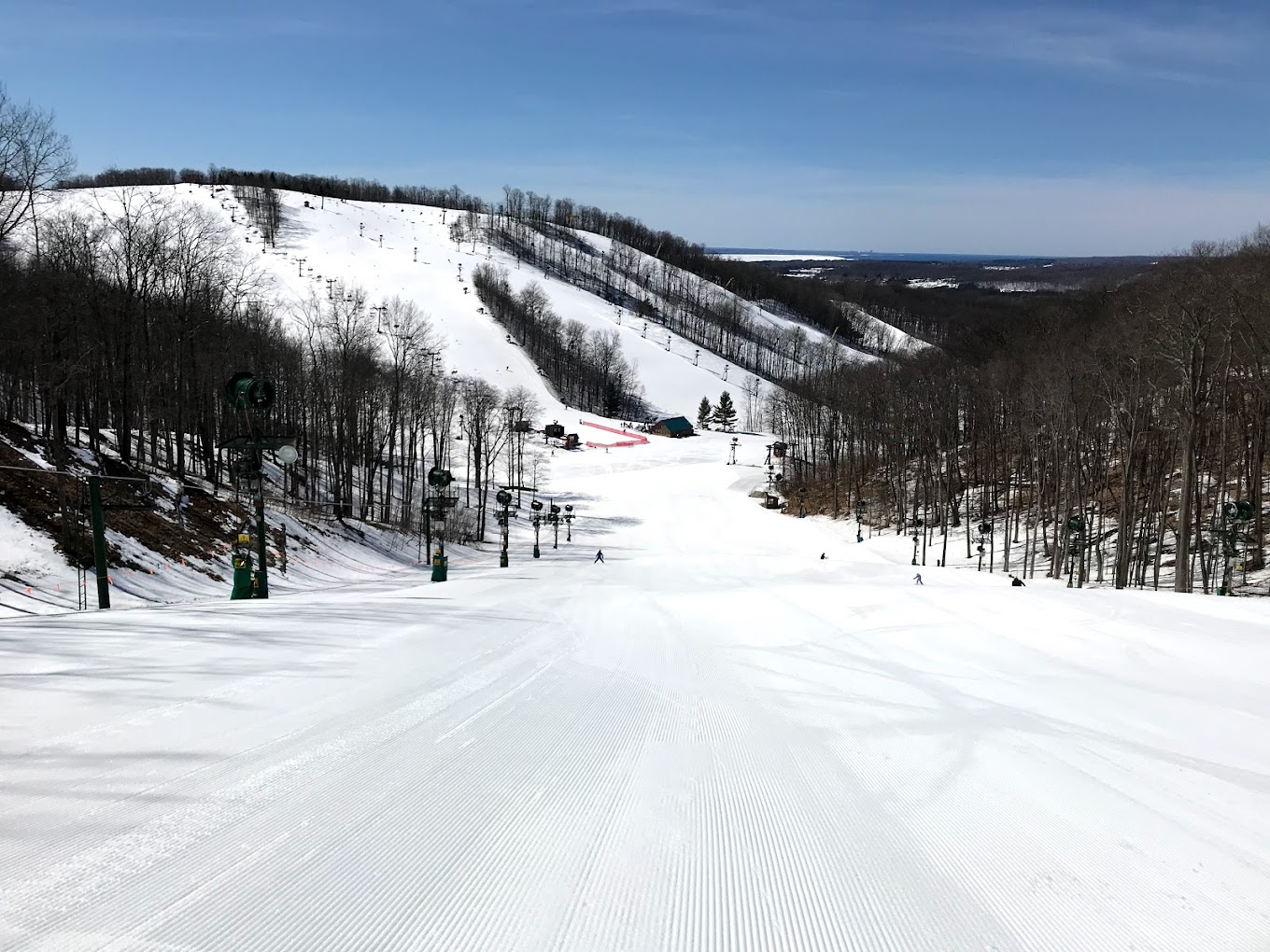 Nubs Nob Ski Area in USA - a ski slope with trees and snow on it.