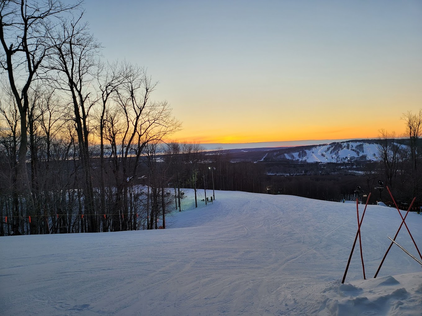 Nubs Nob Ski Area in USA - a ski slope with trees in the background.