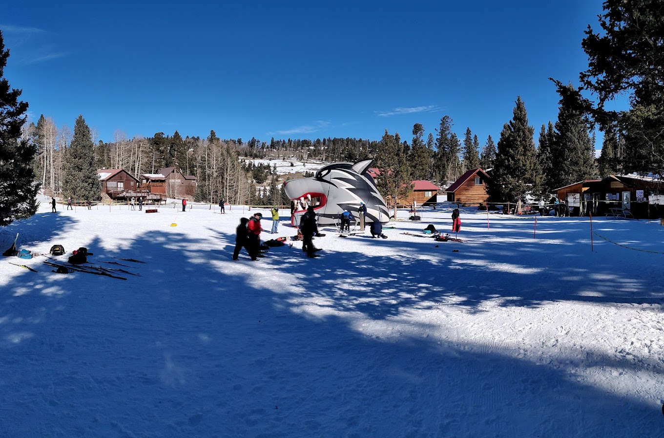 Enchanted Forest Cross Country Ski Area in USA - a group of people are skiing in the snow.