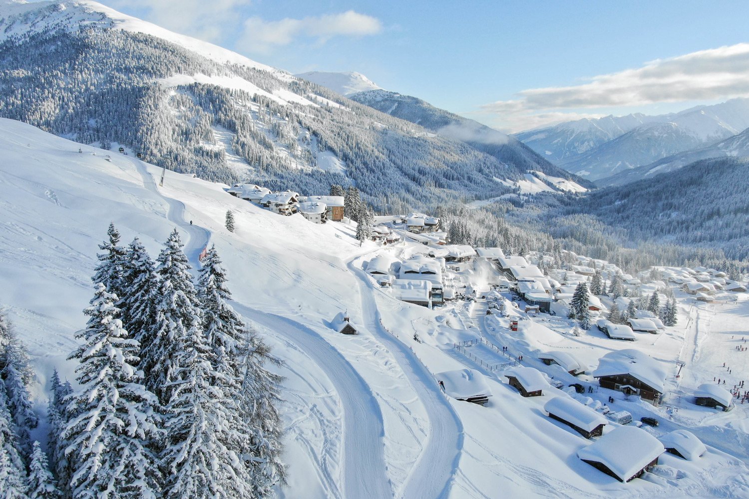 Neunerköpfle – Tannheim in Austria - the view from the top of a snowy mountain.