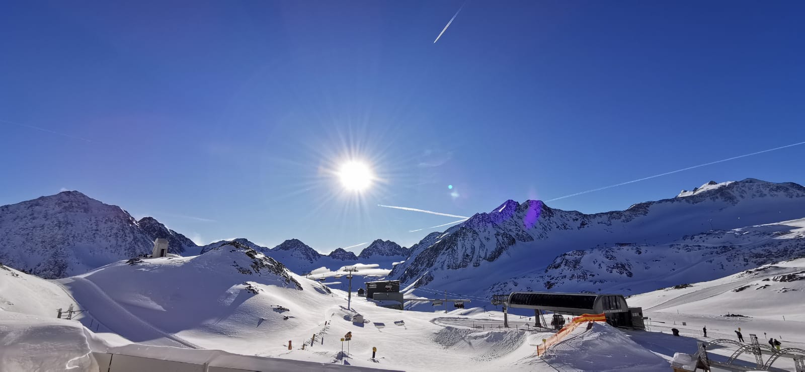 Kristberg – Silbertal in Austria - the sun is shining over the snow covered mountains.