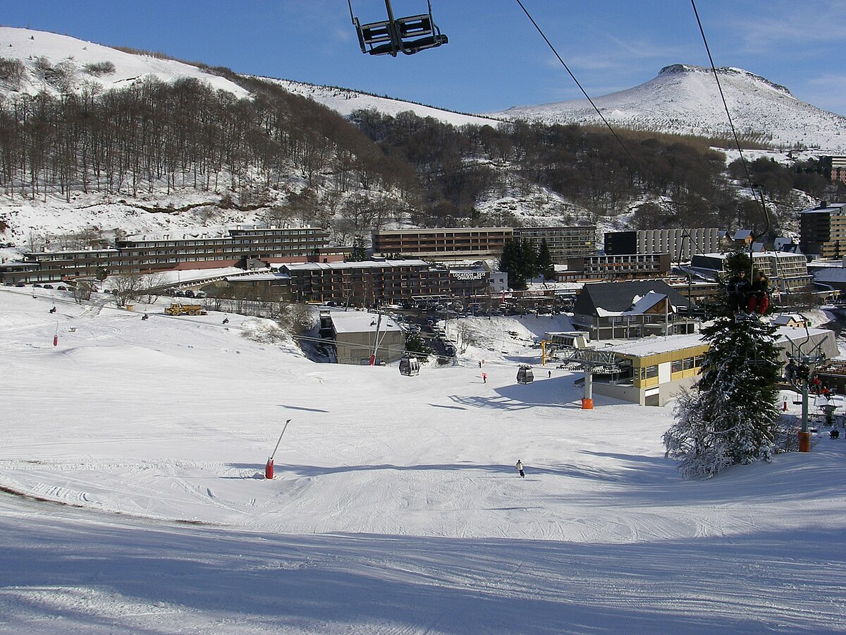 Super-Besse in France - a ski slope with a ski lift in the background.