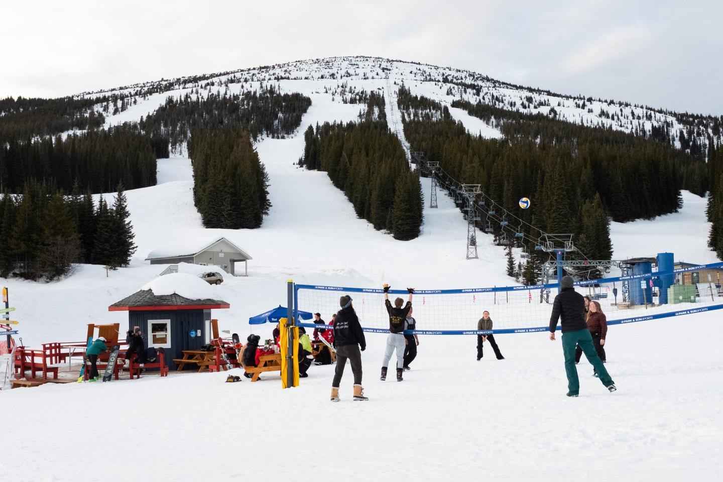 Baldy Mountain Resort in Canada - a group of people playing volleyball in the snow.