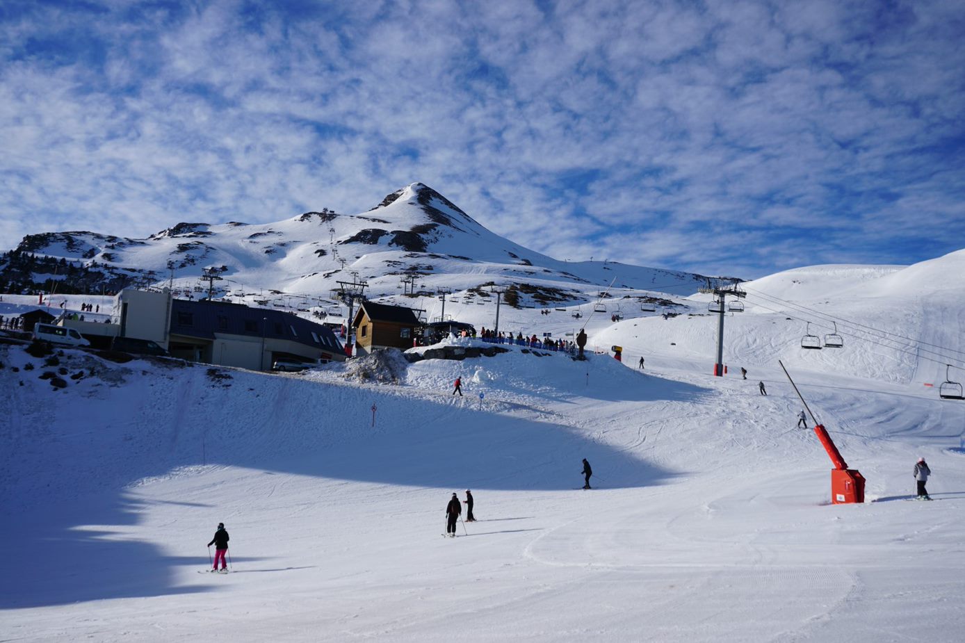 La Pierre Saint Martin in France - a group of people skiing down a mountain.