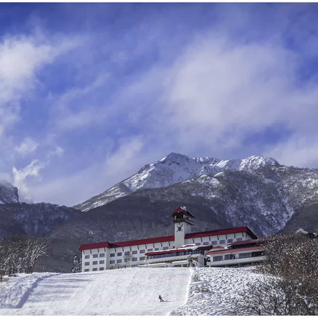 Myoko Akakura Kanko in Japan - white clouds in the sky.