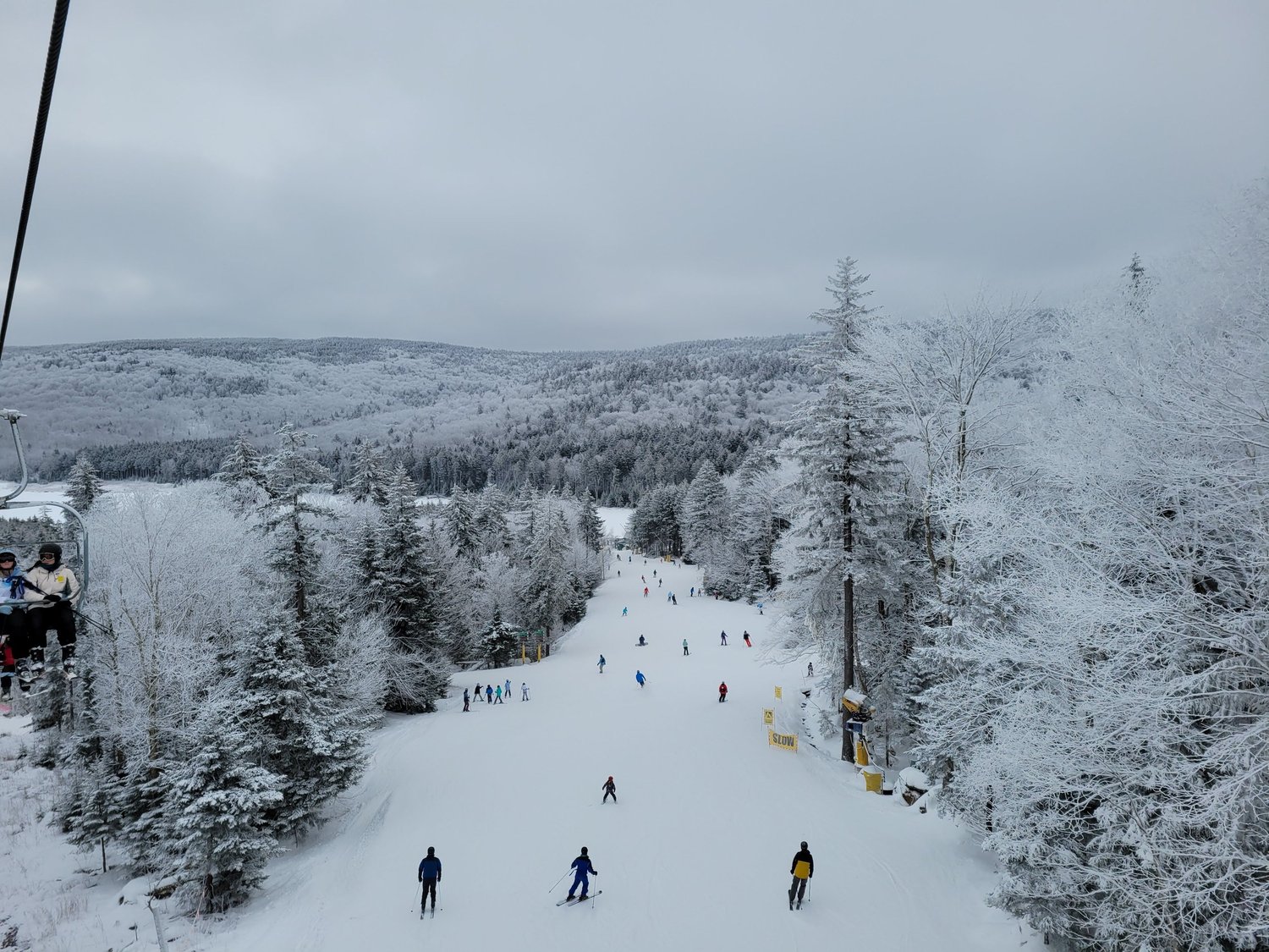 Snowshoe Mountain in USA - a group of people skiing down a ski slope.