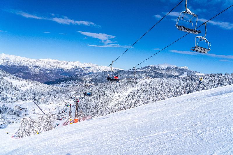 Alpe Cimbra | Folgaria in Italy - a ski lift going up the mountain.