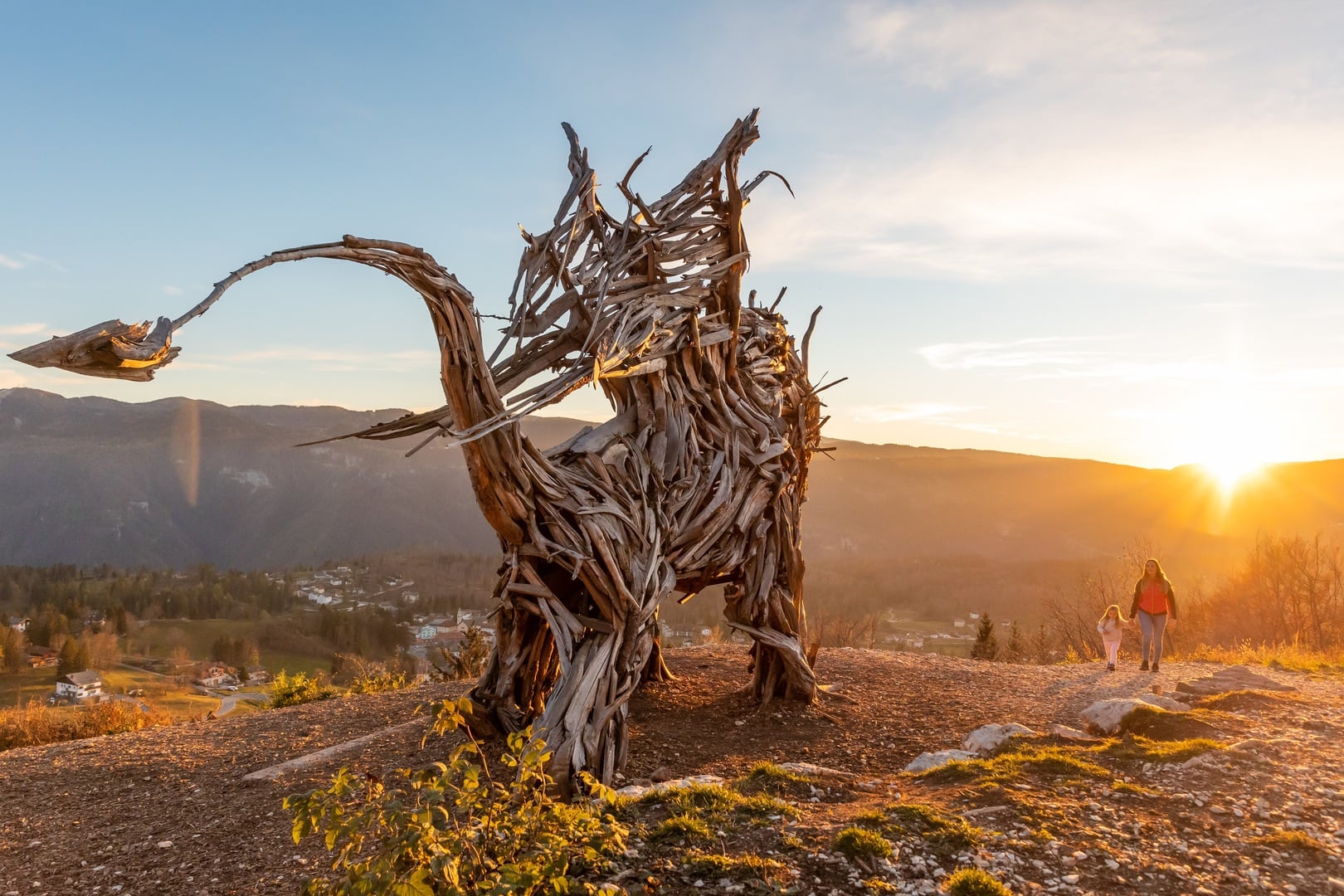 Alpe Cimbra | Folgaria in Italy - a sculpture made out of driftwood in the mountains.