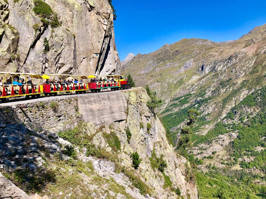 Petit train d'Artouste in France - a train on the side of a mountain.
