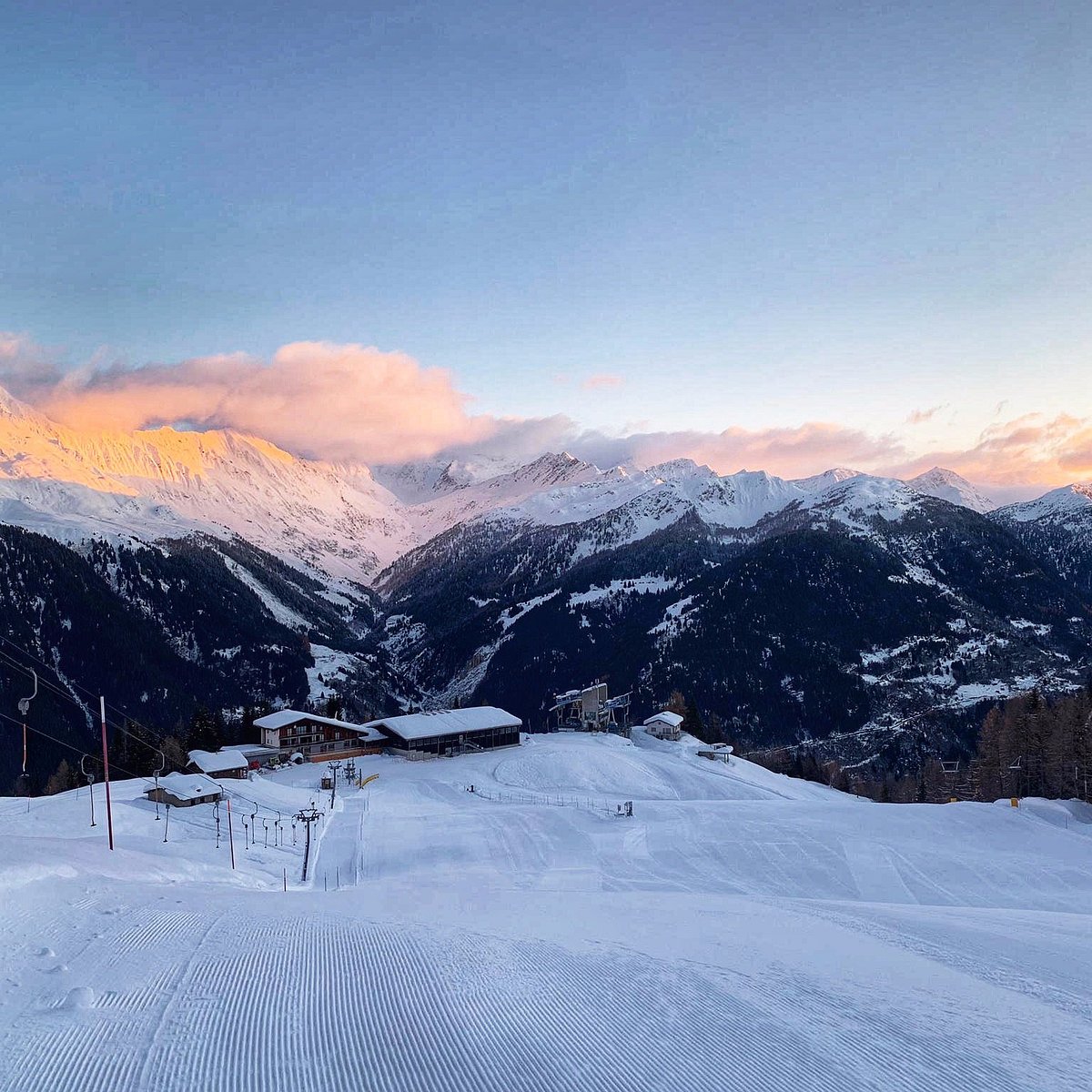 Funivie Airolo-Pesciüm in Switzerland - a view of the mountains from a ski slope.