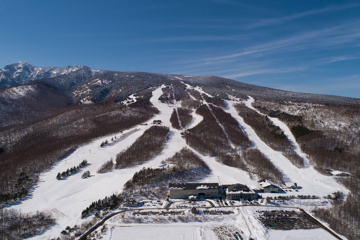 Palcall Tsumagoi in Japan: an aerial view of a ski resort in the mountains.