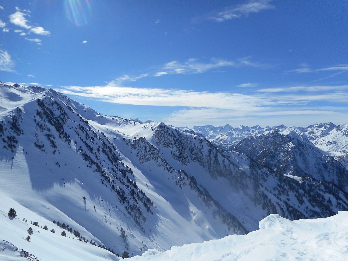 Luz Ardiden in France - a view from the top of a snowy mountain.