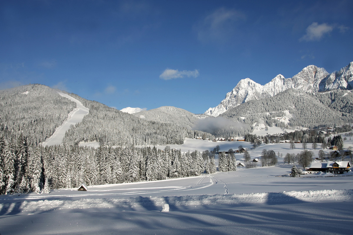Präbichl in Austria - a view of a snow covered mountain range.