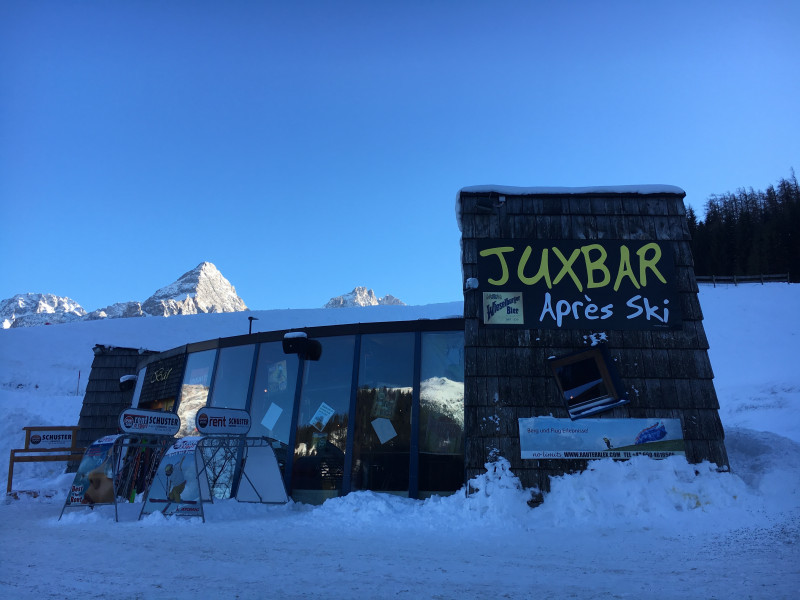 Grubigsteinbahnen Lermoos in Austria: a building with graffiti written on it in the snow.