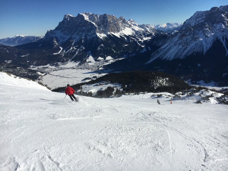 Grubigsteinbahnen Lermoos in Austria - a person skiing down a snow covered mountain.