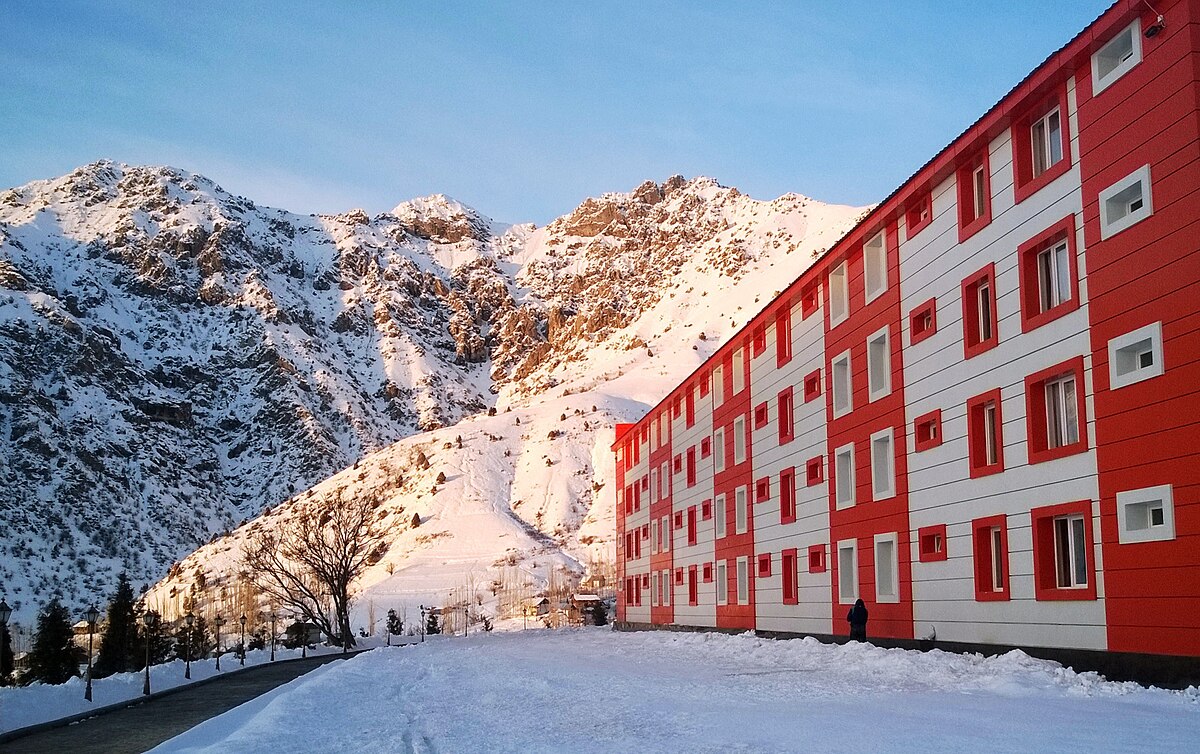 Safed Dara in Tajikistan: a red and white building in the snow.