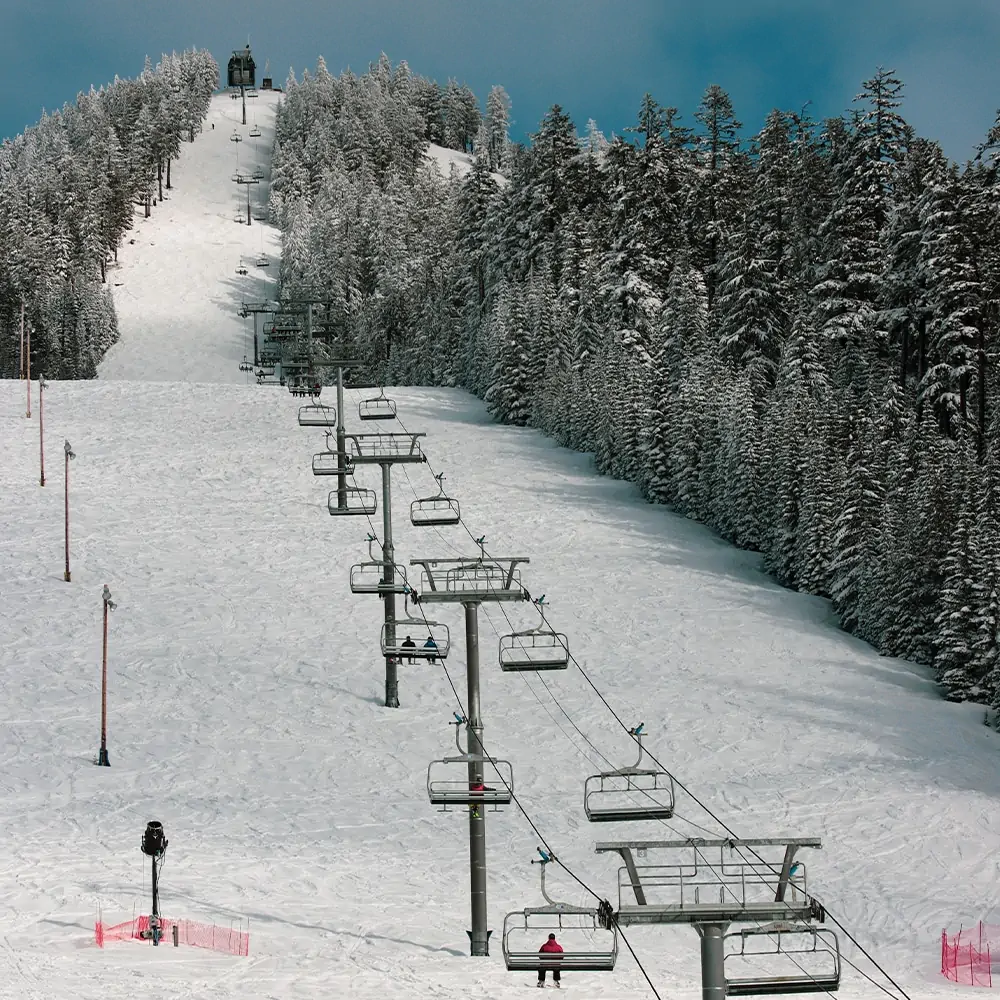 Willamette Pass Resort in USA - a ski lift going down a snowy slope.