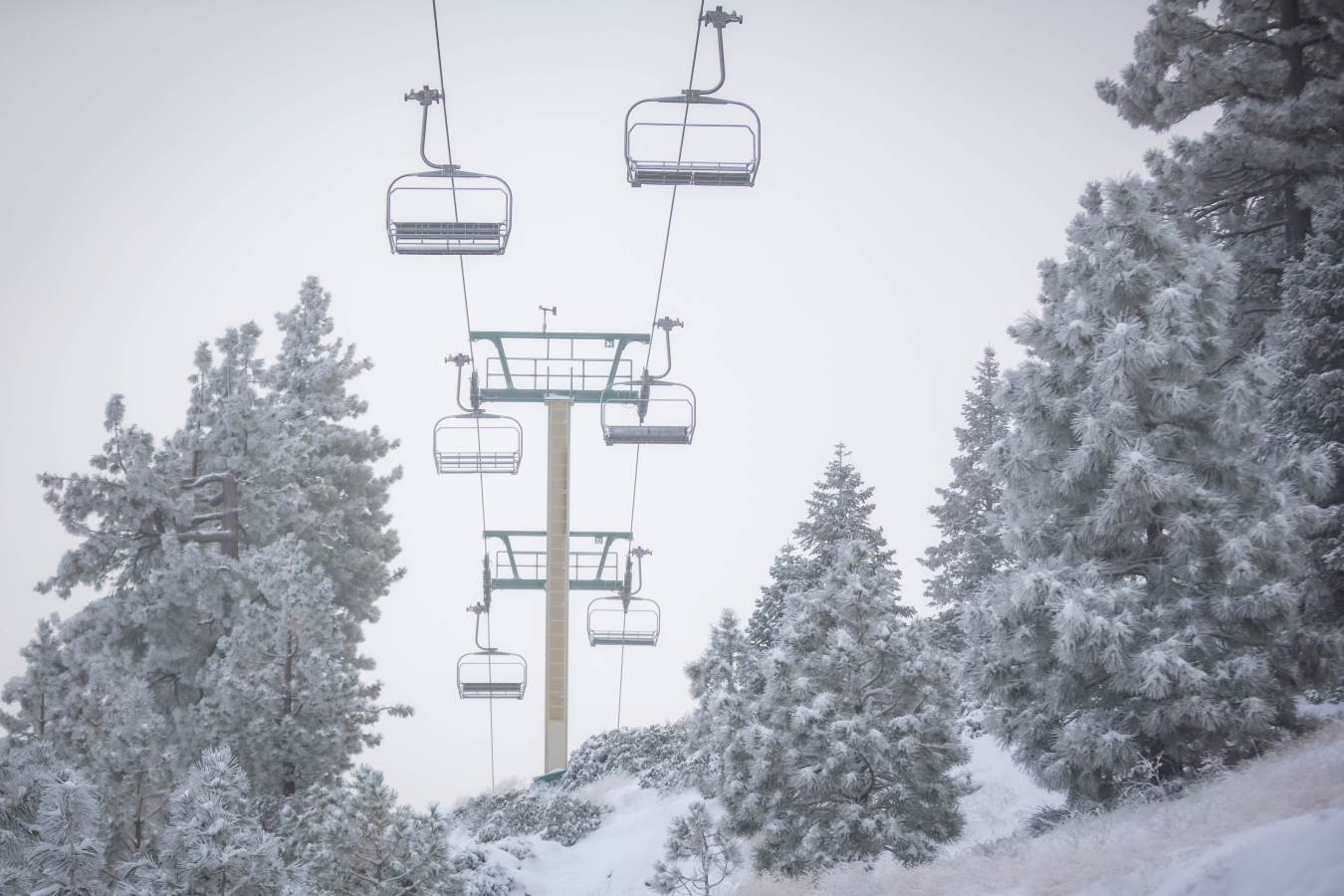 Snow Summit in USA - a ski lift going up a snowy mountain.