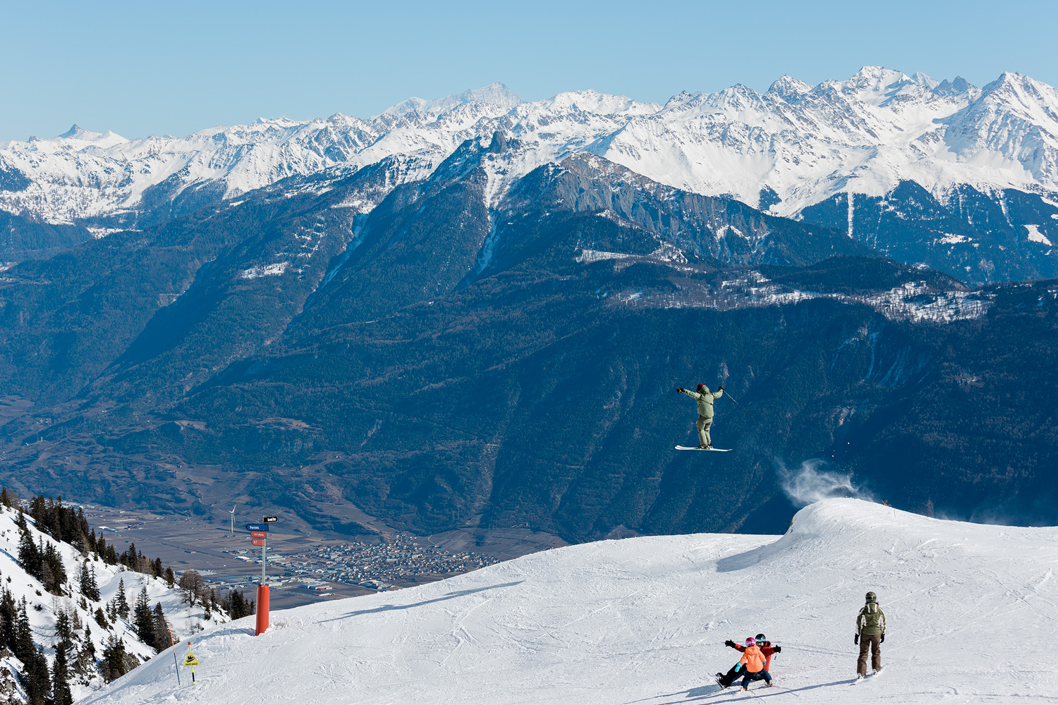 Les Marécottes in Switzerland - a person on a snowboard on a snowy slope.