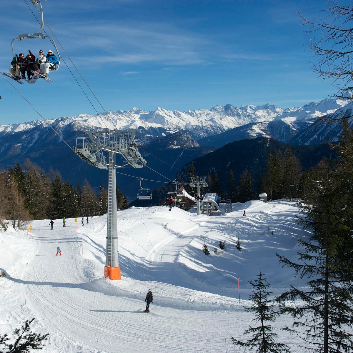 Les Marécottes in Switzerland - a ski lift going down a snowy slope.