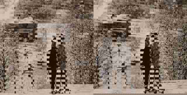 Image of a charming chalet in the snowy landscape of Tänndalen, Northern Sweden. Visible elements include a distant ski lift and towering mountain, painting a picturesque winter sports scene.