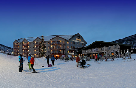 Ski resort in Tänndalen, Northern Sweden, featuring ski lifts and a winter sports center set amongst the snowy landscape.