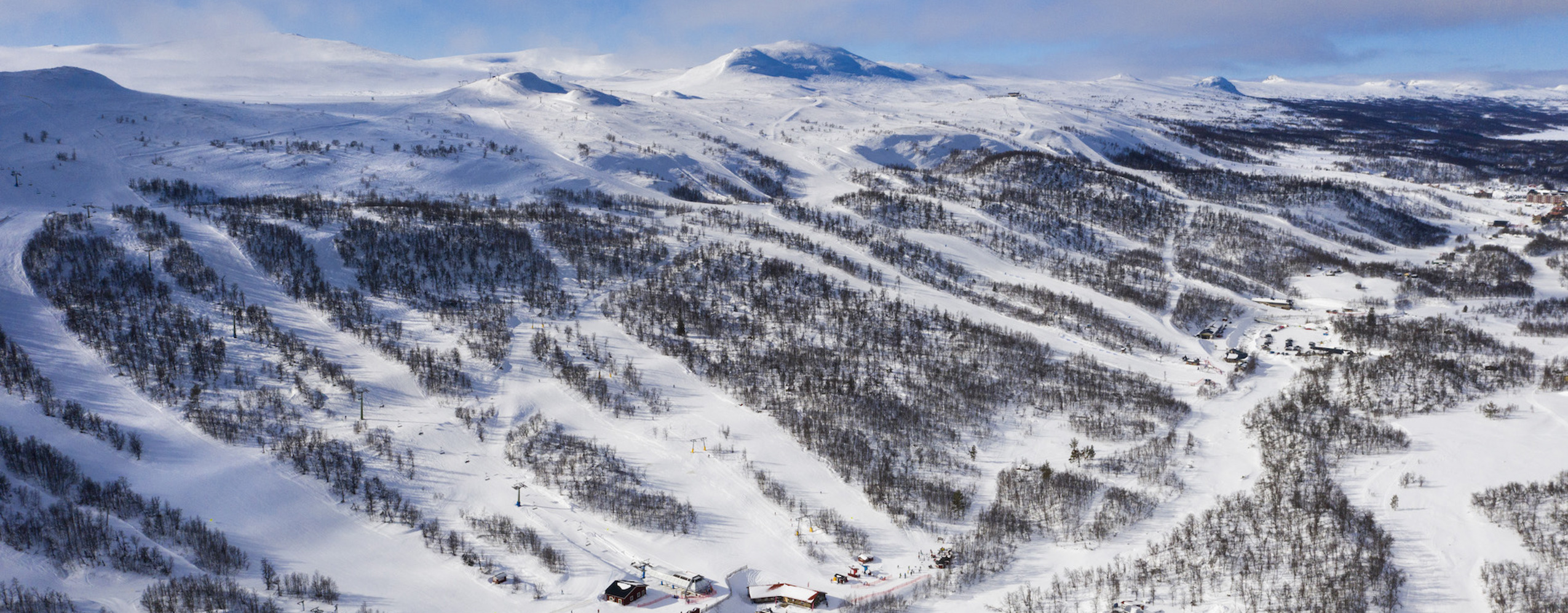 A ski resort in Tänndalen, Northern Sweden, featuring snow-covered slopes, providing a stunning winter scenery for winter sports activities.
