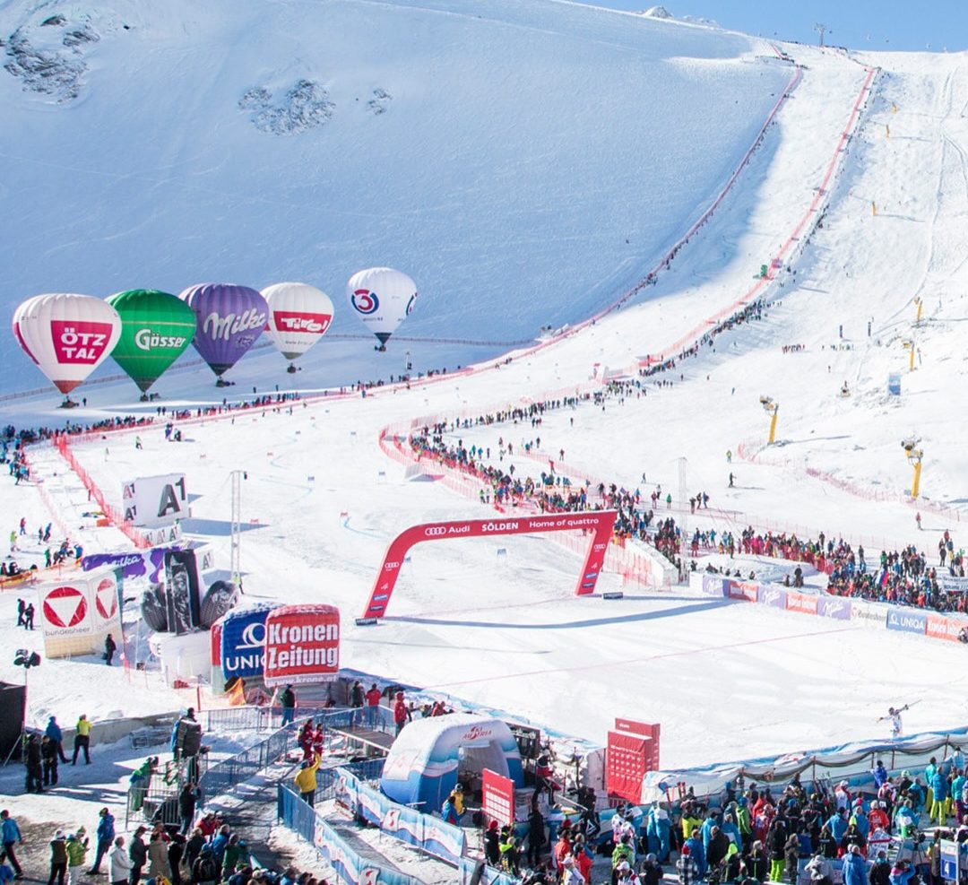 Sölden in Austria - a group of people standing on a snow covered slope.
