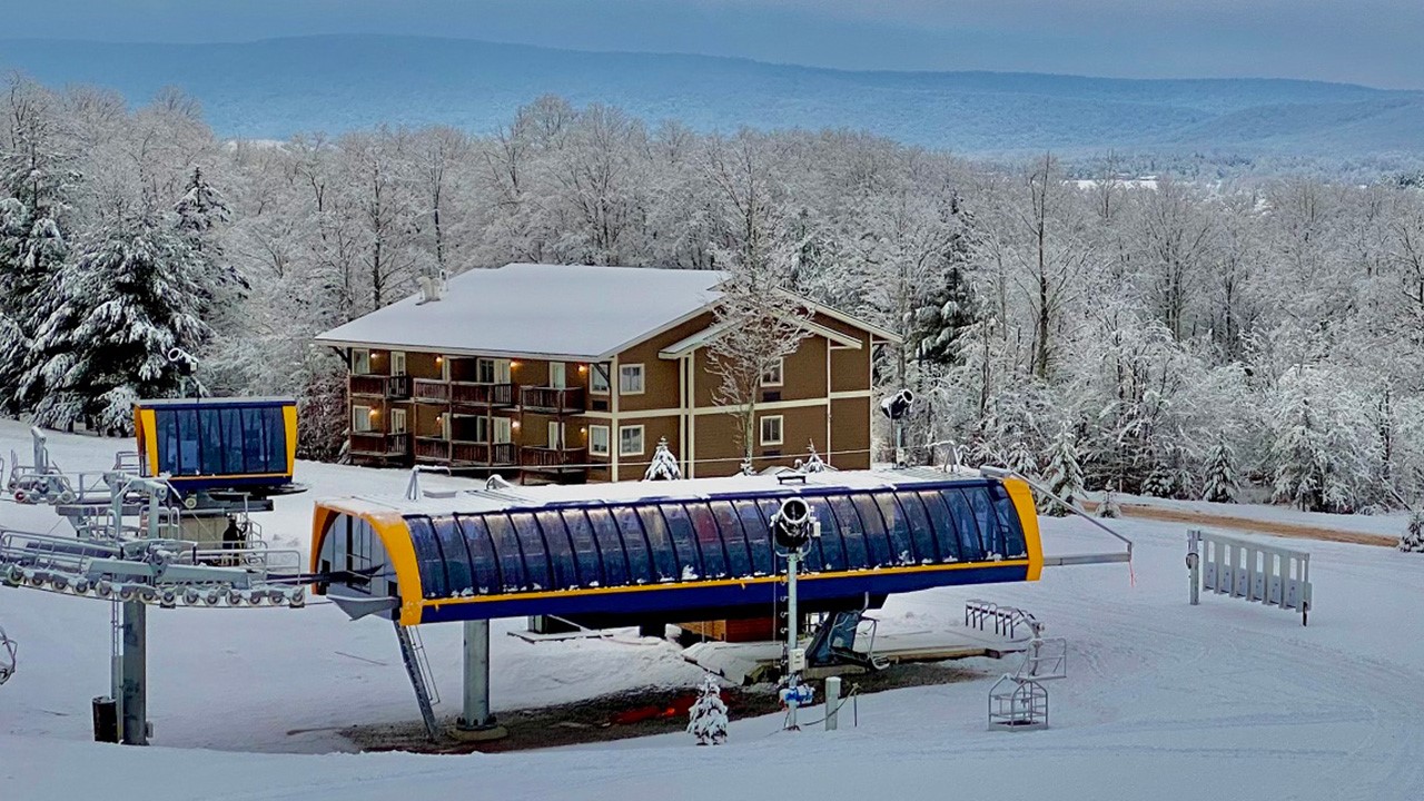Timberline Mountain in USA - a house in the middle of a snow covered field.