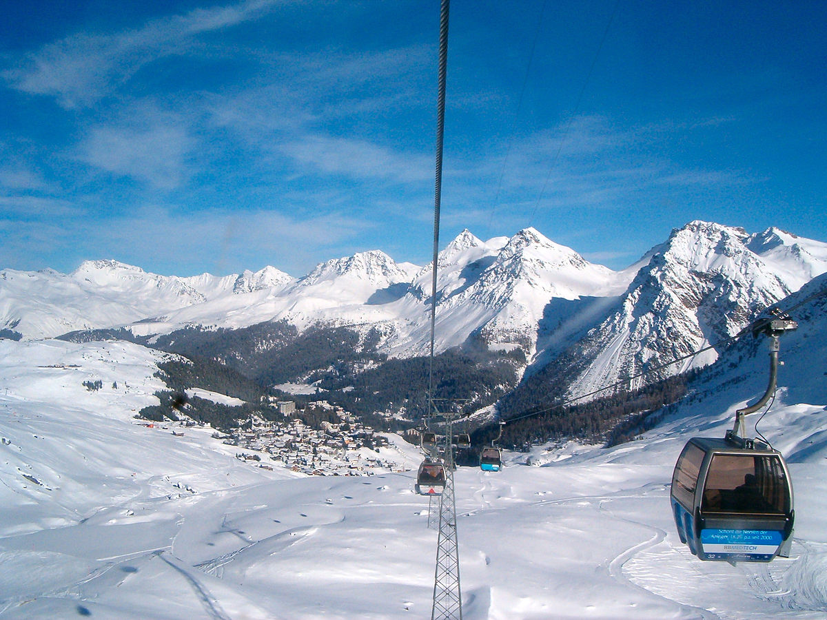 Arosa Lenzerheide in Switzerland - a ski lift going up a snowy mountain.