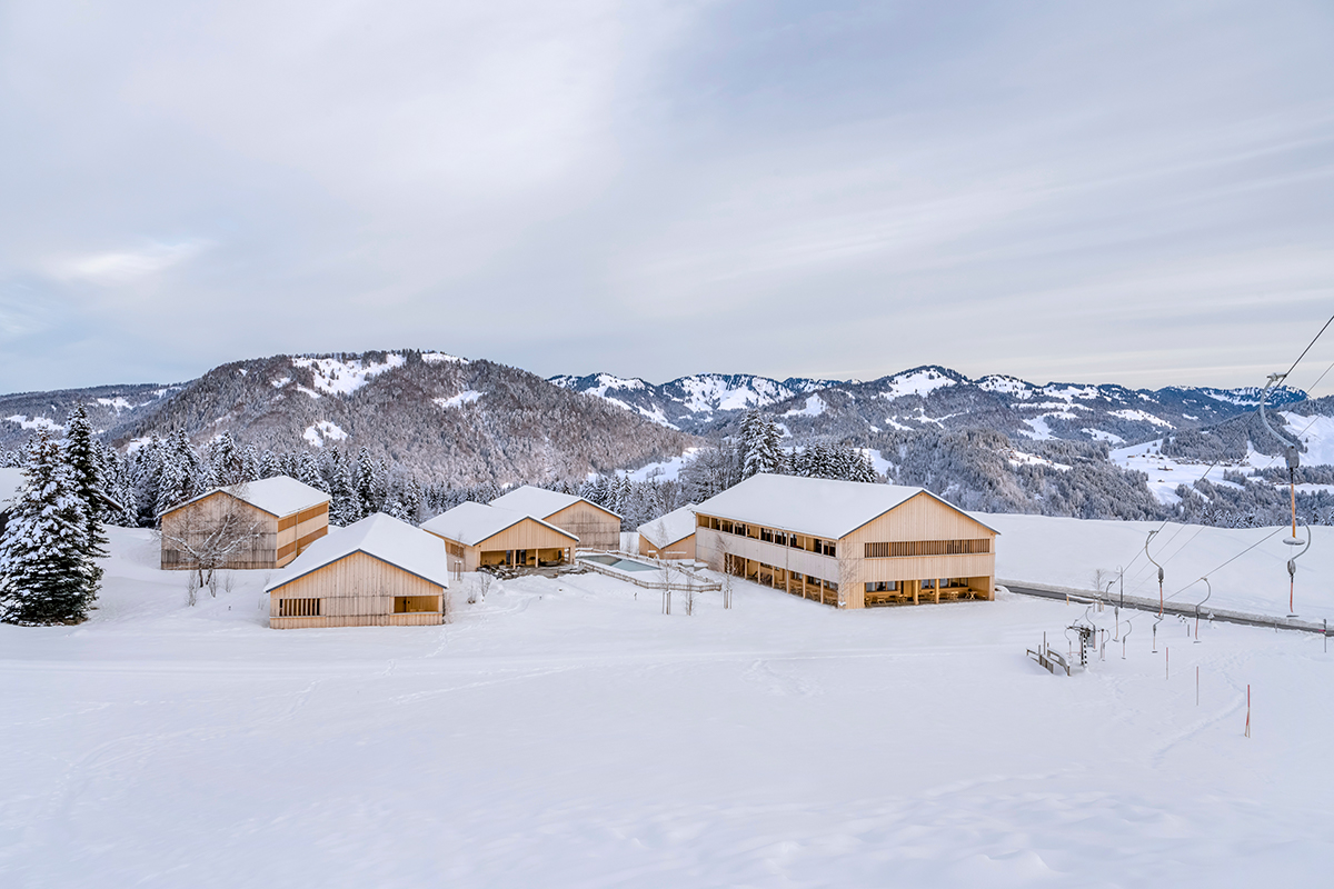 Schetteregg – Egg in Austria - a group of snow covered houses in the snow.