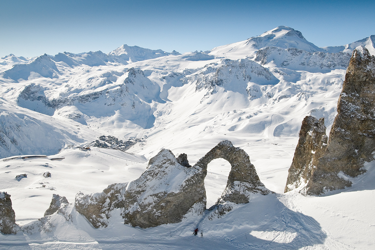Tignes in France - a person skiing down a snowy mountain.