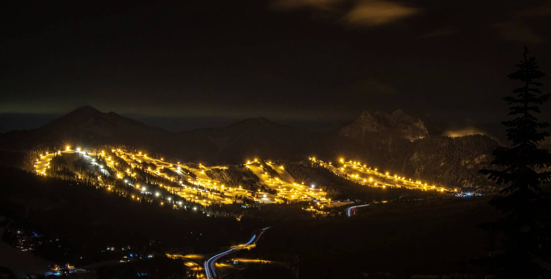 The Summit at Snoqualmie in USA - a night time view of a mountain town.
