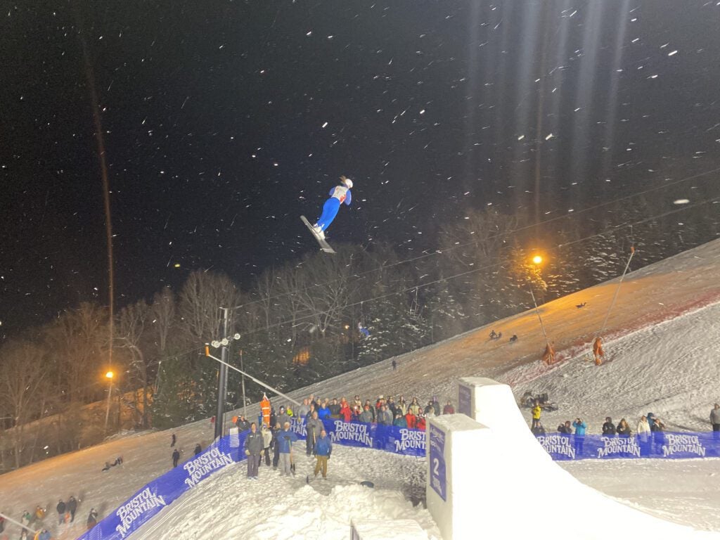 Bristol Mountain in USA - a person flying through the air on a snowboard.